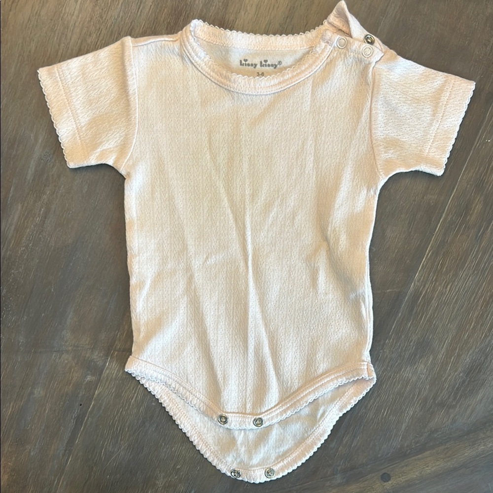 Light pink kissy kissy bodysuit